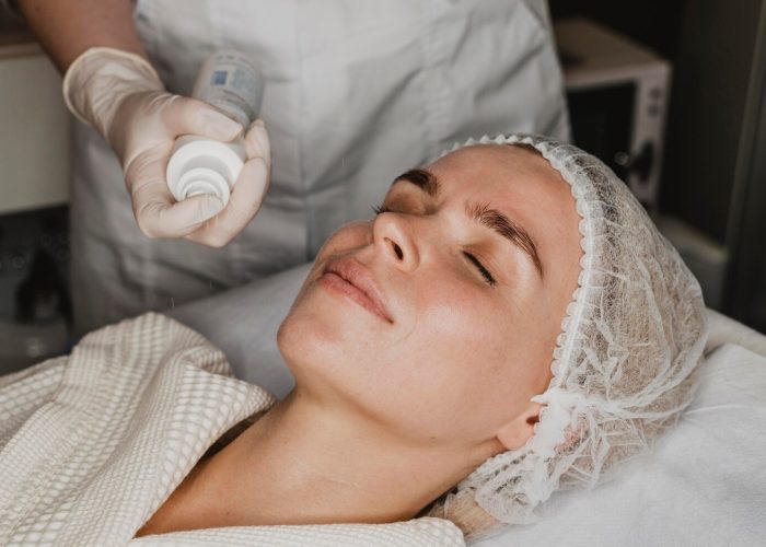 young-woman-getting-face-skin-treatment-spa_23-2148825383
